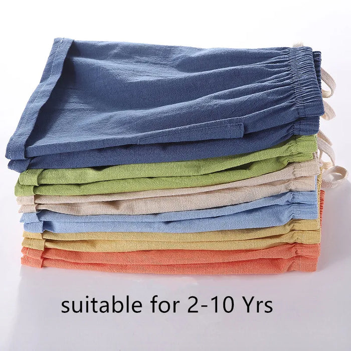 Stack of kids' cotton linen shorts in nine colours, for ages 2-10