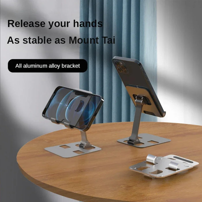 Two phone stands holding phones on a table, one folded