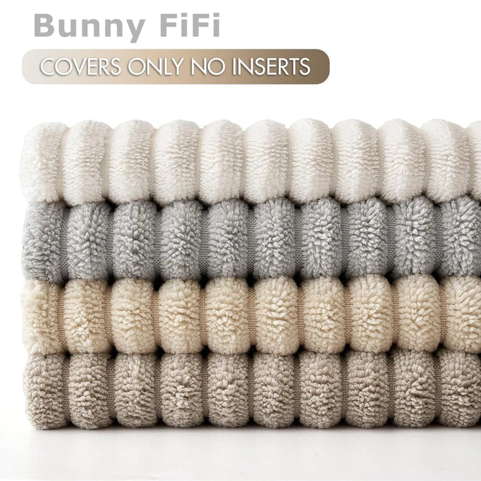 Stack of folded corduroy cushion covers, covers only, no inserts