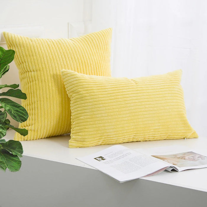 Yellow corduroy cushions, square and rectangular