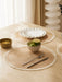Round placemats with plates and a bowl of limes