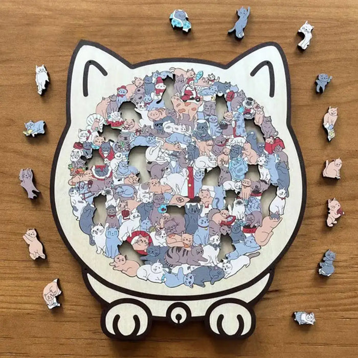 Finished cat puzzle with loose cat-shaped pieces around it