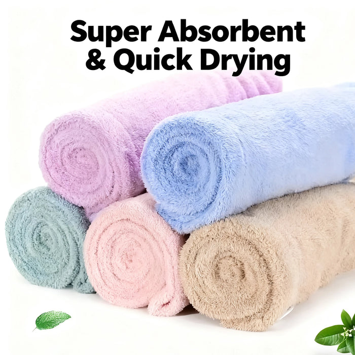 Rolled coral fleece hair towels in pastel colours
