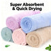 Rolled coral fleece hair towels in pastel colours