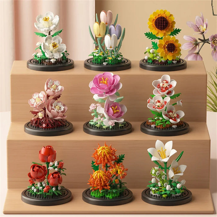 Flower bouquets in domes on shelves: lilies, tulips, sunflowers, roses and peonies