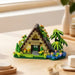 A-frame forest cabin building block set with palm trees