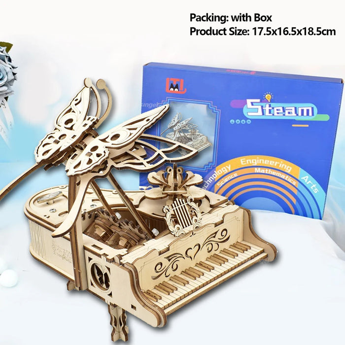 Piano music box beside its retail box, 17.5 x 16.5 x 18.5 cm