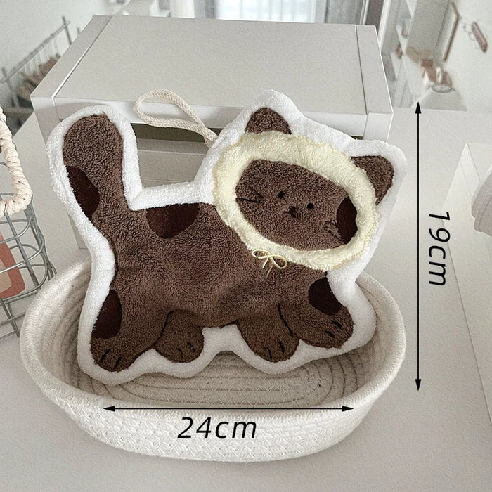 Dark brown cat hand towel with a cream hood, 24 x 19 cm