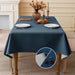 Navy blue linen-look tablecloth on a dining table