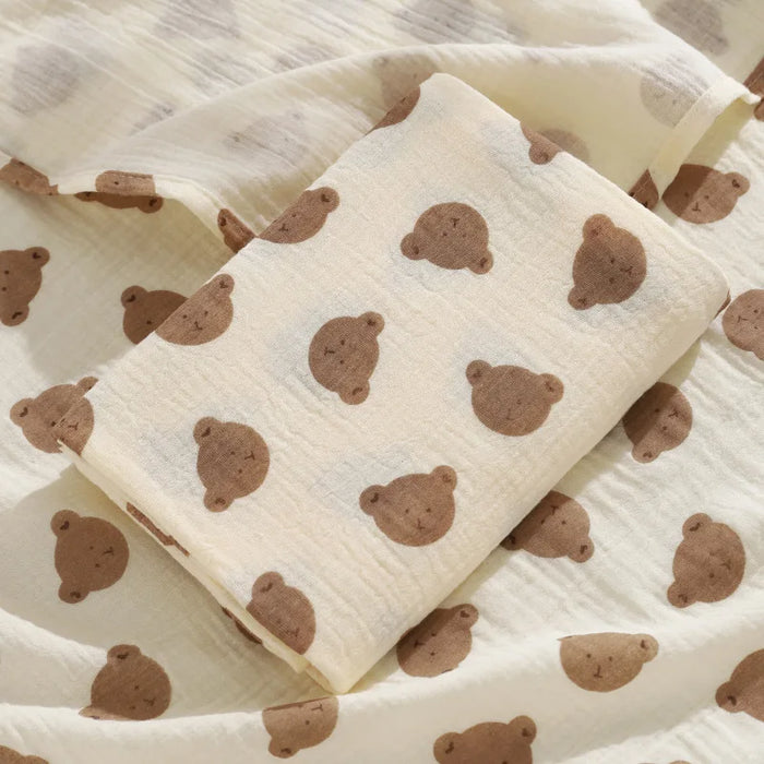 Muslin swaddle blanket with large bear head print